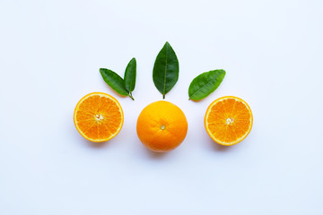 High vitamin C. Fresh orange citrus fruit with leaves isolated on white