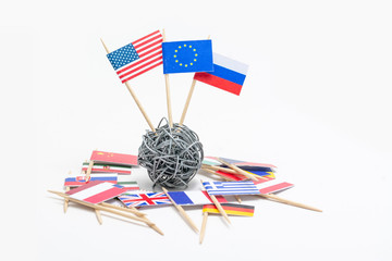Fototapeta na wymiar Trade war - economic and politic conflict betwen United States, European Union and Russia - flags on wire ball