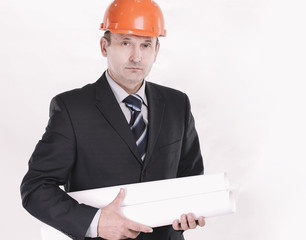 confident engineer with the drawings of the new project