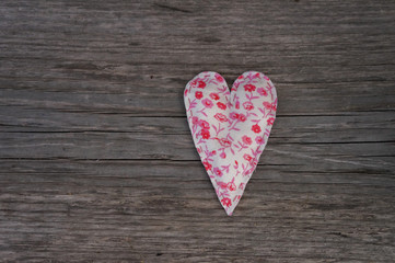 handmade fabric hearts on a rural background, valentine's day