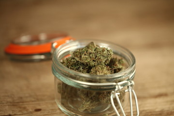medical cannabis marijuana in a glass jar