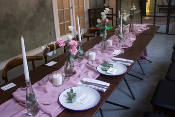 Gorgeous long wedding table. Wedding decoration concept.