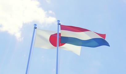 Japan and Netherlands, two flags waving against blue sky. 3d image