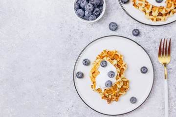 Fresh homemade waffles with blueberries for breakfast