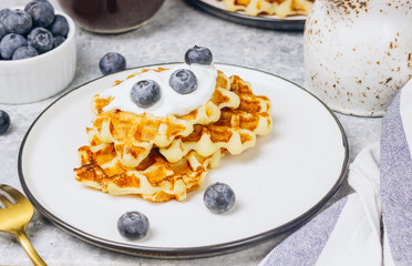 Fresh homemade waffles with blueberries for breakfast