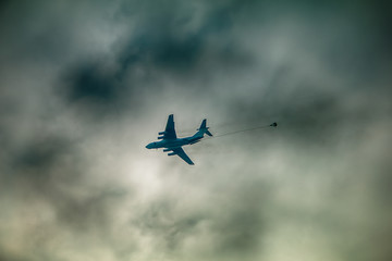 Army paratroopers jumping at air war action.