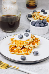 Fresh homemade waffles with blueberries for breakfast