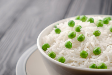 Fresh steamed rice with young green peas.
