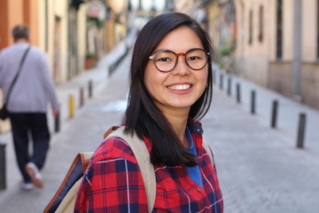 Contemporary Asian woman looking happy 