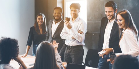 Business colleagues discussing new project on meeting