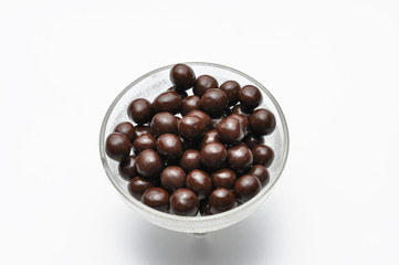 Tasty chocolate balls isolated on a white background