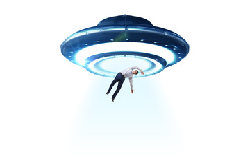 Flying saucer abducting young businessman 