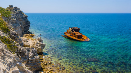 old shipwreck near a sea coast
