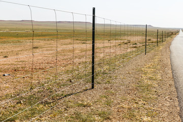 wire mesh fence, wire mesh along the highway, Inner Mongolia, China