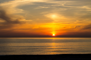 Naklejka premium Sonnenuntergang mit Wolken