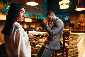 Couple in quarrel, husband and wife in nightclub