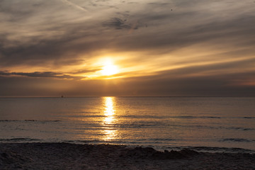 Fototapeta na wymiar Sunset on the beach, polish sea baltic