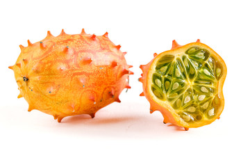 Fototapeta premium Fresh organic kiwano or horned melon on white background.