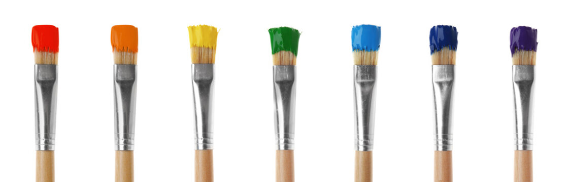 Set of colorful paint brushes on white background