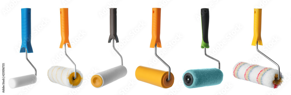 Poster Set of clean roller paint brushes on white background