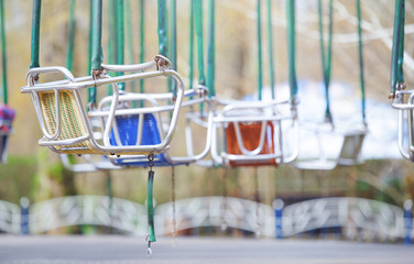 Empty chain swing in amuzement park