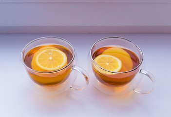 Food. green tea with lemon, winter, two cups