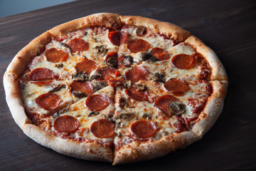 pizza with salami and cheese