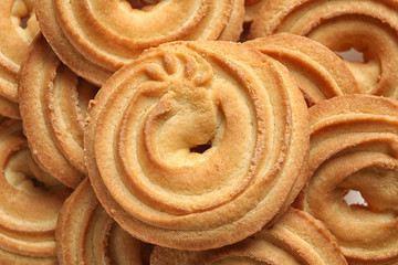 Delicious Danish butter cookies as background, closeup