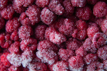 raspberries on wooden background