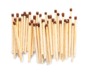 Pile of wooden matches on white background, top view