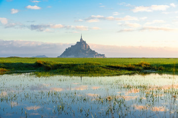 Mont Saint Michel abbey on the island with reflection, Normandy, Northern France, Europe