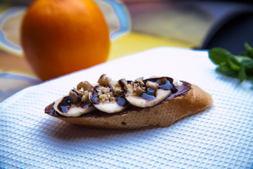 sandwich on a blackboard with a knife cutter