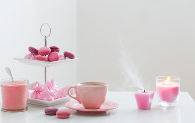 cup of coffee with dessert on white table