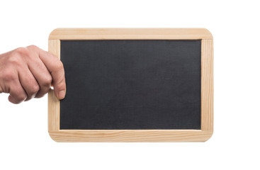 Cropped hand holding a blank slate board with wooden frame, isolated on white background