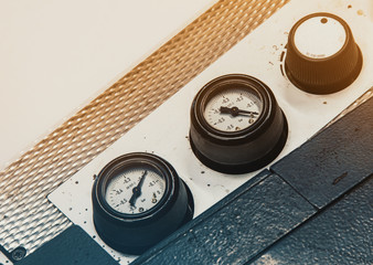 Manometers, indicators on the equipment in the workshop, factory