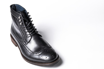 Men's classic black deep shoes isolated on white background. Modern men's black shoes