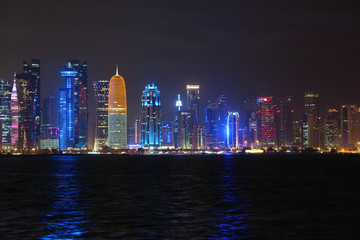 Obraz na płótnie Canvas Financial centre in Doha city at night, Qatar