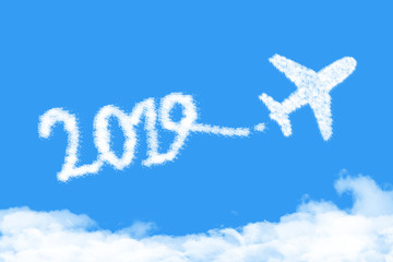 Fototapeta premium Airplane shape clouds 2019 route. Happy new year concept