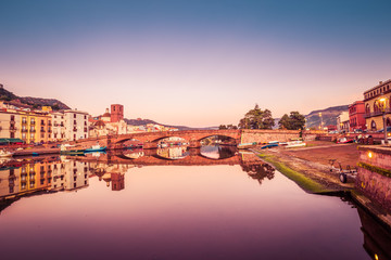 Obraz premium Cityscape during sunset of the colorful small town Bosa in Sardinia, Italy