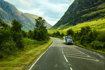 Car on a mountain road in Scotland,UK