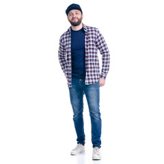 Man in jeans, shirt and cap standing smiling on white background isolation