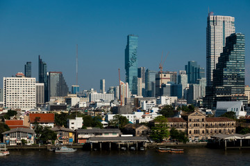 Obraz premium Bangkok city skyline during day time in travel and office building business new tower landmark district.