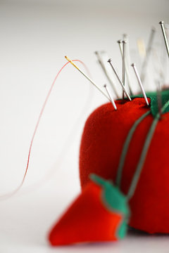 Pins And Sewing Needles In A Pin Cushion