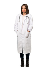 A full-length shot of a Young doctor woman smiling a lot over isolated white background