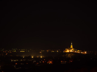 Fototapeta premium Full moon over the city. Full moon over Nitra city. Dark sky and full moon.