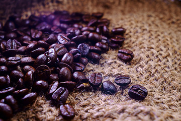 select coffee roasted beans on sacking background