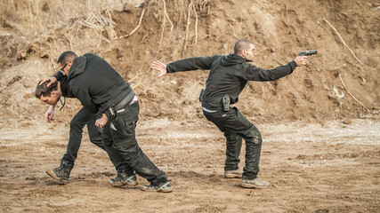 Bodyguard and VIP people security protection. Combat gun shooting training