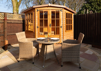 Table set for outdoor dining in sunshine