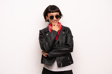 Woman with leather jacket and handkerchief with glasses and smiling