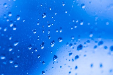 City. Drops in window